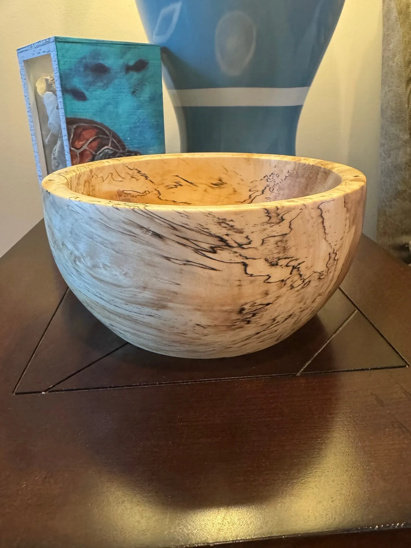 Spalted maple bowl detail showing dark zone lines through pale wood