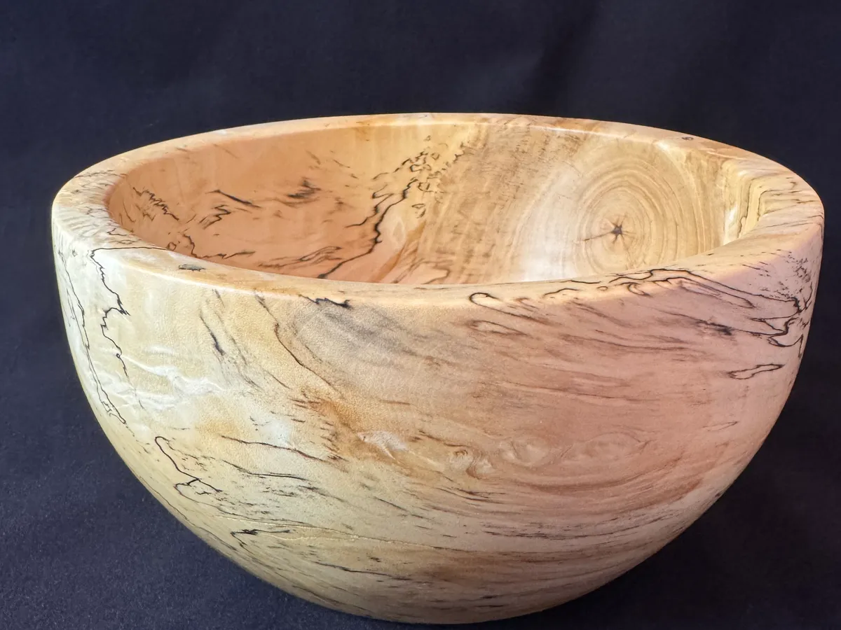 Interior view of small spalted maple bowl with natural zone-line pattern