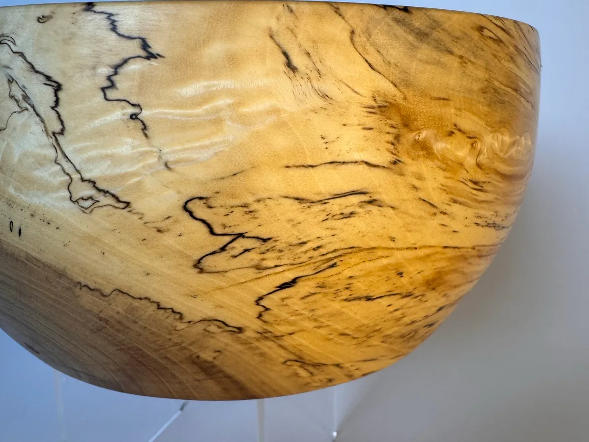 Small spalted maple bowl photographed in natural light