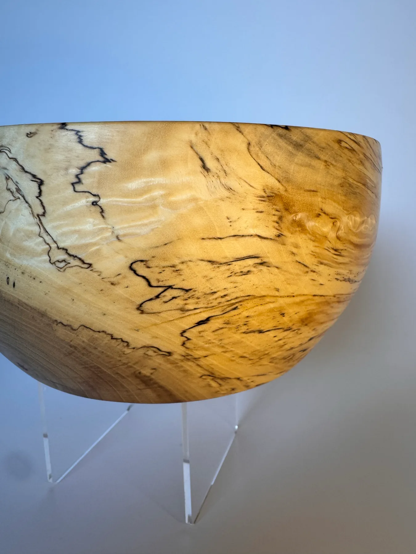 Small spalted maple bowl photographed in natural light