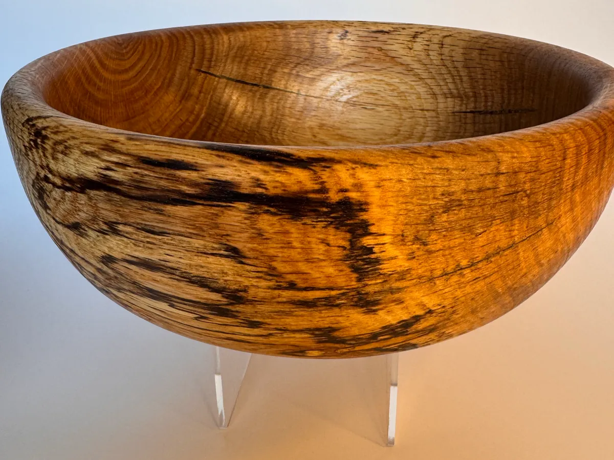 Spalted oak bowl with warm grain and natural figure