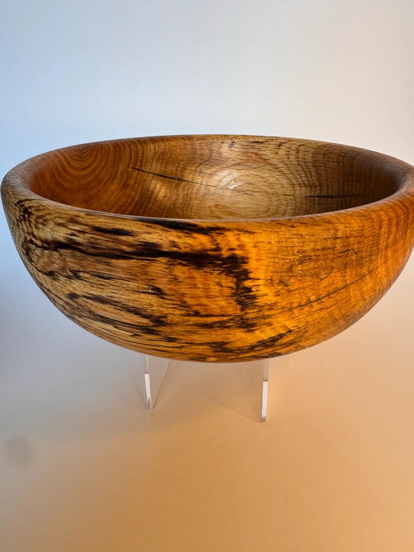 Spalted oak bowl with warm grain and natural figure