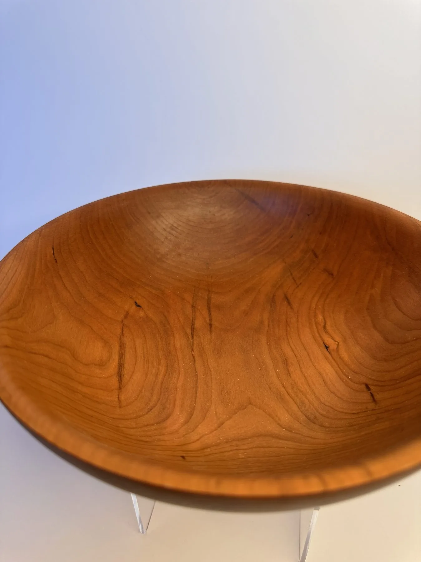 Close interior view of medium cherry bowl with smooth oil finish