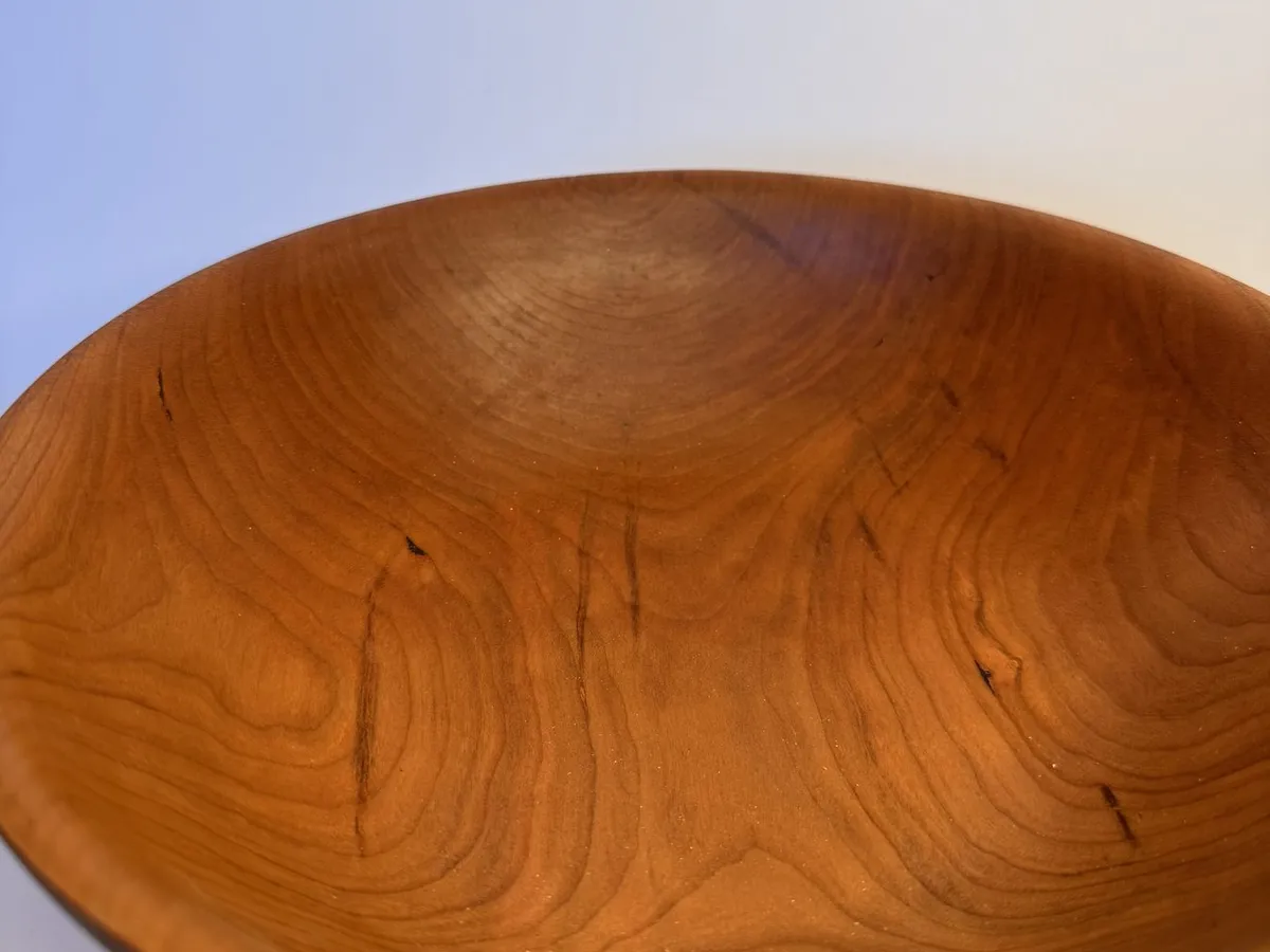 Close interior view of medium cherry bowl with smooth oil finish